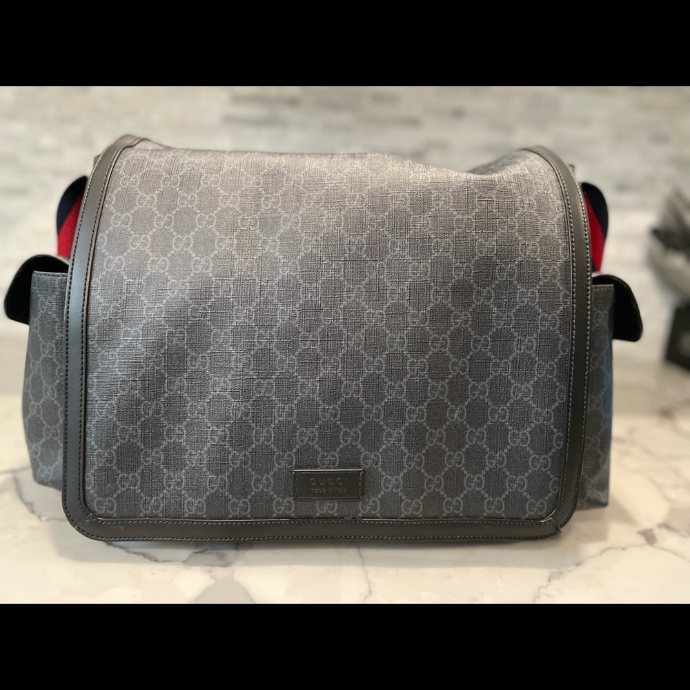 Black Gucci GG supreme diaper bag. Like new!